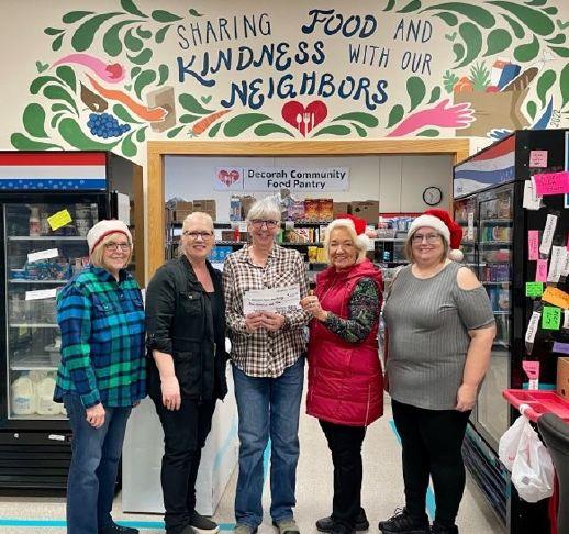 Northern Lights Women's Chorus donates to the Decorah Community Food ...